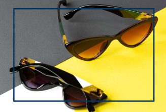 top-view-modern-black-sunglasses-pair-yellow-black-background-isolated-vision-spectacles-elegance_140725-16987